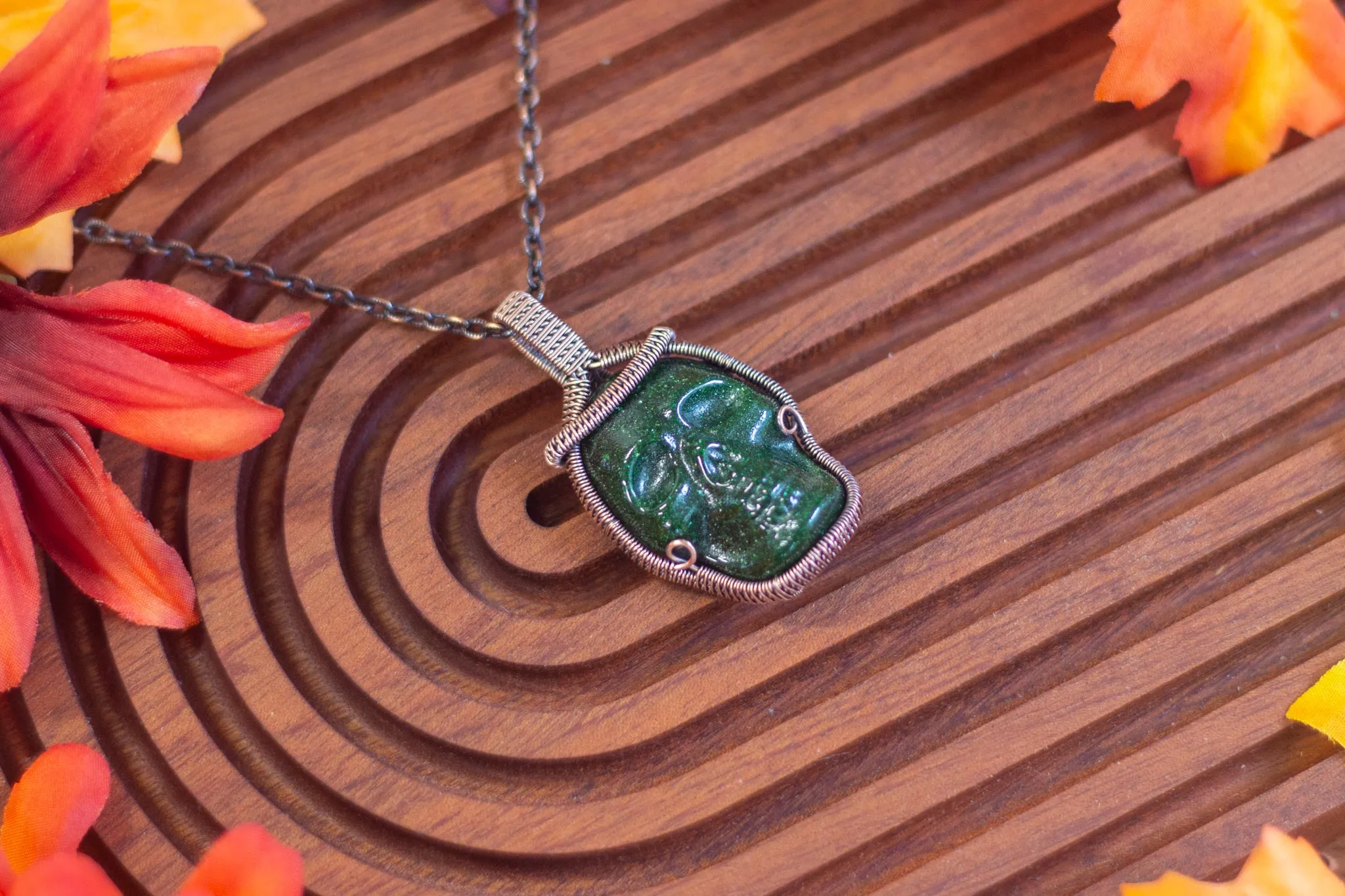 Dark Glittery Green Skull with Copper Wire Wrapping
